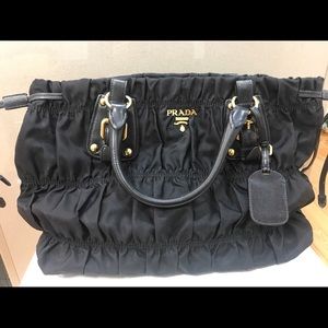 Sold at Auction: A GOOD BLACK LEATHER PRADA SOFT RUFFLE BAG. 29cm long.